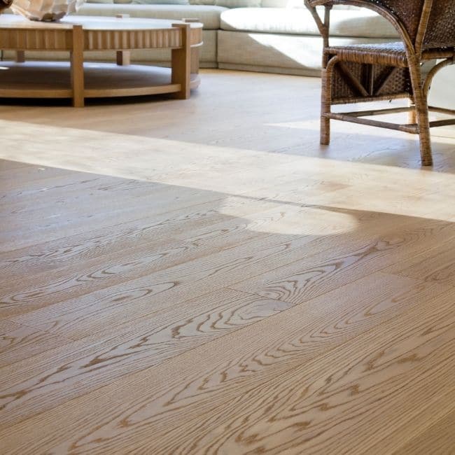 Image depicts new wood floors in a Montreal home.