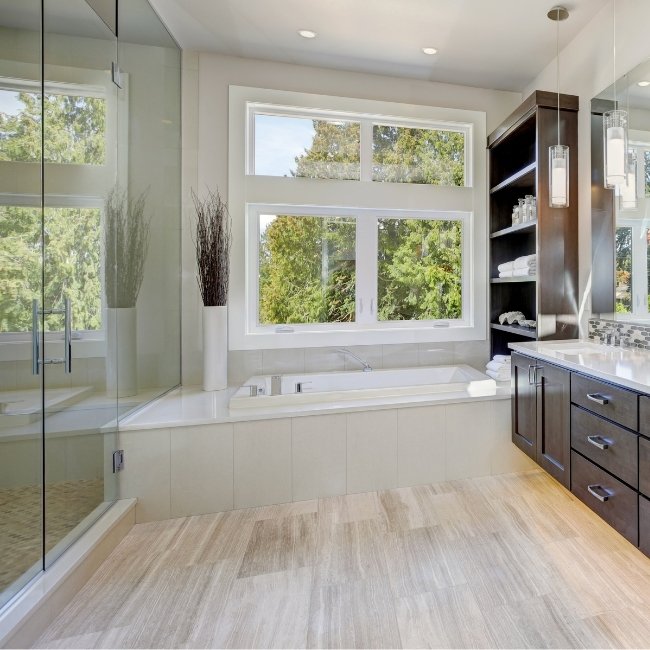 Image depicts a bathroom in a Vancouver home with new flooring.