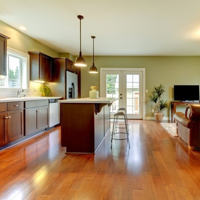 Image depicts the interior of a home with newly installed American cherry hardwood floors.