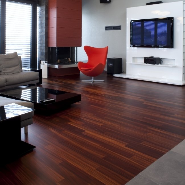 Image depicts a living room with massaranduba hardwood floors.