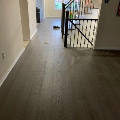 Image depicts a engineered hardwood flooring installation project in Brampton.