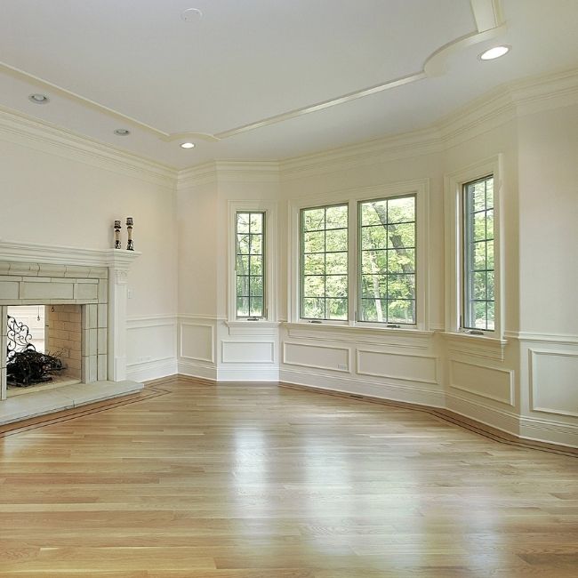 Image depicts the interior of a Markham home with newly installed light hardwood floors.