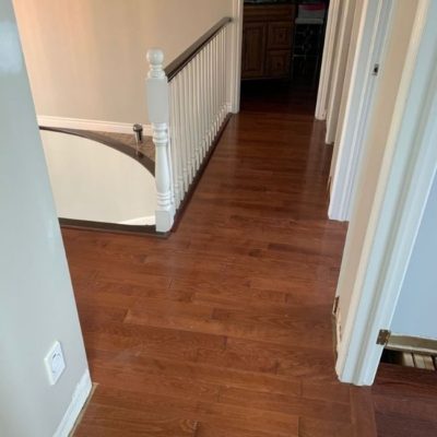 Image depicts a laminate flooring installation project in Mississauga by Flooring Liquidators.