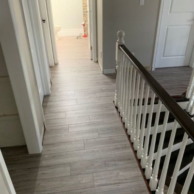 Image depicts a laminate flooring installation project in Mississauga by Flooring Liquidators.