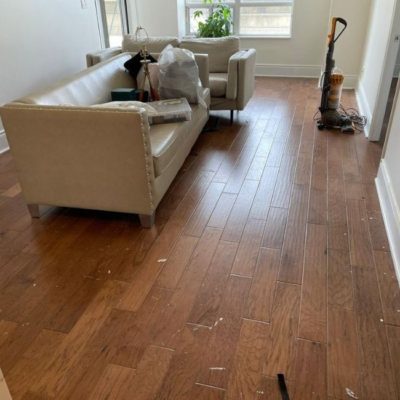 Image depicts a laminate flooring installation project in Mississauga by Flooring Liquidators.