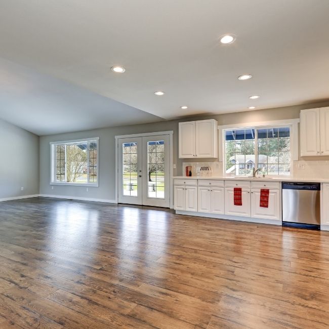 Image depicts the interior of a Markham home with newly installed laminate floors.