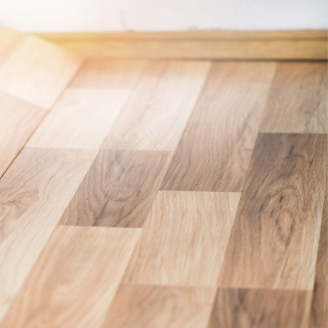 Image depicts a close up of laminate floors in a Newmarket home.