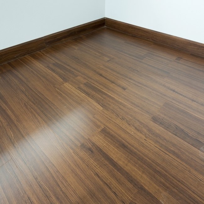 Image depicts a living room in Toronto with new laminate floors.