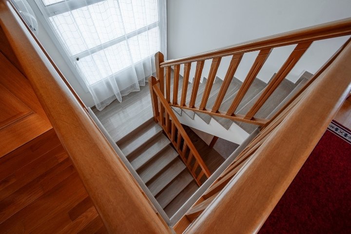 Image depicts new stairs and railings in a North York home.
