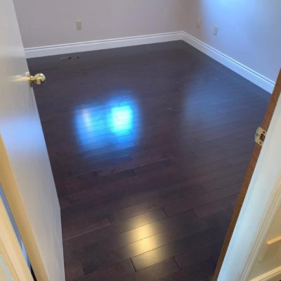 Image depicts a solid hardwood flooring installation project by Flooring Liquidators in London, Ontario.