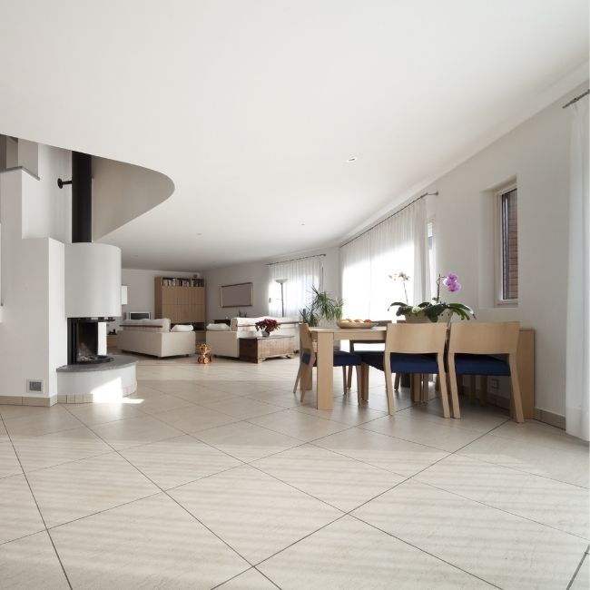 Image depicts the interior of a Newmarket home with new white tile floors.