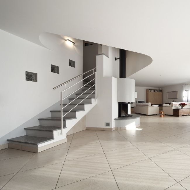 Image depicts the interior of a Markham home with newly installed white tile floors.
