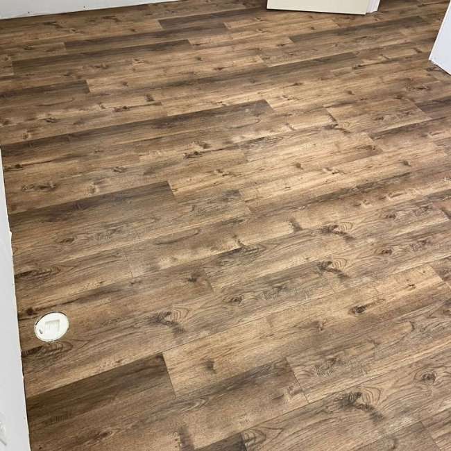 Image depicts a vinyl flooring North York installation project inside a North York home.