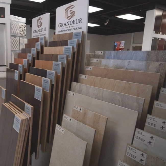 Image depicts wholesale flooring products displayed in a showroom.