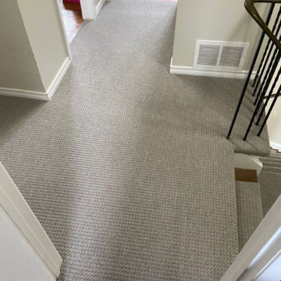 Image depicts new floors from a berber carpet flooring installation project in Brampton, Ontario.