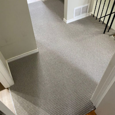 Image depicts new floors from a berber carpet flooring installation project in Brampton, Ontario.