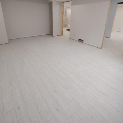 Image depicts new floors from a click vinyl flooring installation project in London, Ontario.