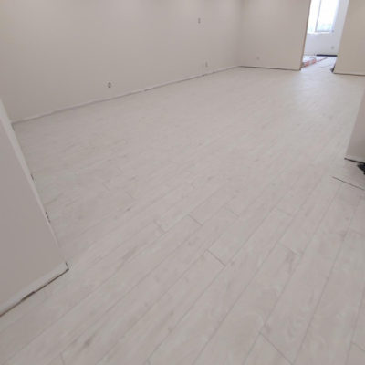Image depicts new floors from a click vinyl flooring installation project in London, Ontario.