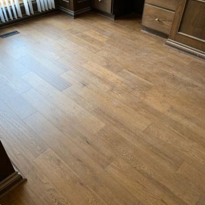 Image depicts newly installed wood floors from a engineered hardwood flooring installation project in London, Ontario.