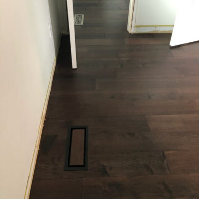 Image depicts new floors from an engineered hardwood flooring installation project in Scarborough, Ontario.