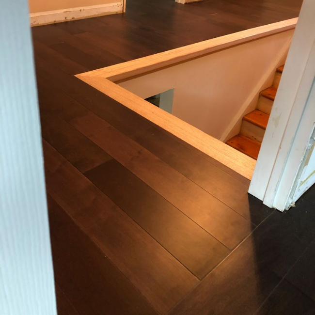 Image depicts new floors from an engineered hardwood flooring installation project in Scarborough, Ontario.