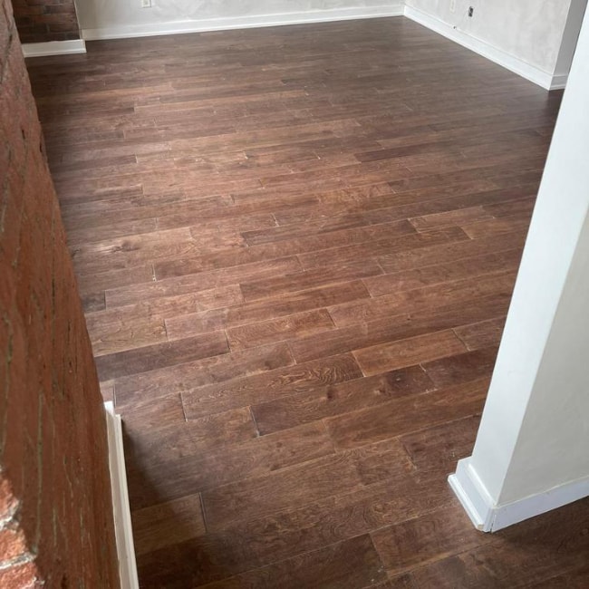 Image depicts new floors from an engineered hardwood flooring installation project in Toronto, Ontario.