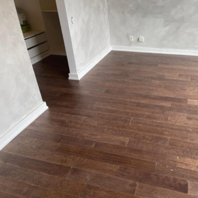 Image depicts new floors from an engineered hardwood flooring installation project in Toronto, Ontario.