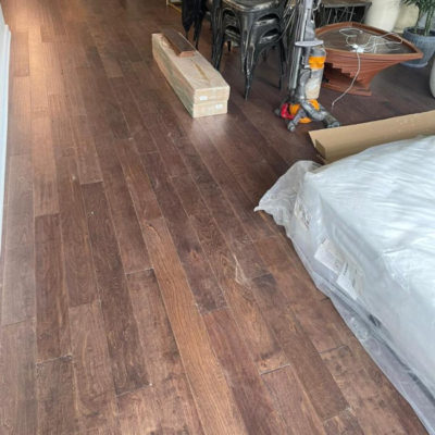 Image depicts new floors from an engineered hardwood flooring installation project in Toronto, Ontario.