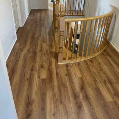 Image depicts new floors from a laminate flooring installation project in Mississauga, Ontario.