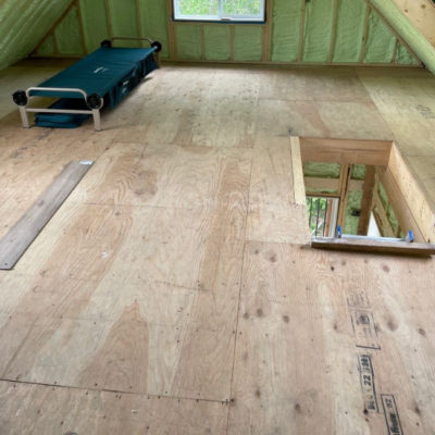 Image depicts old floors from a loose lay vinyl flooring installation project in London, Ontario.