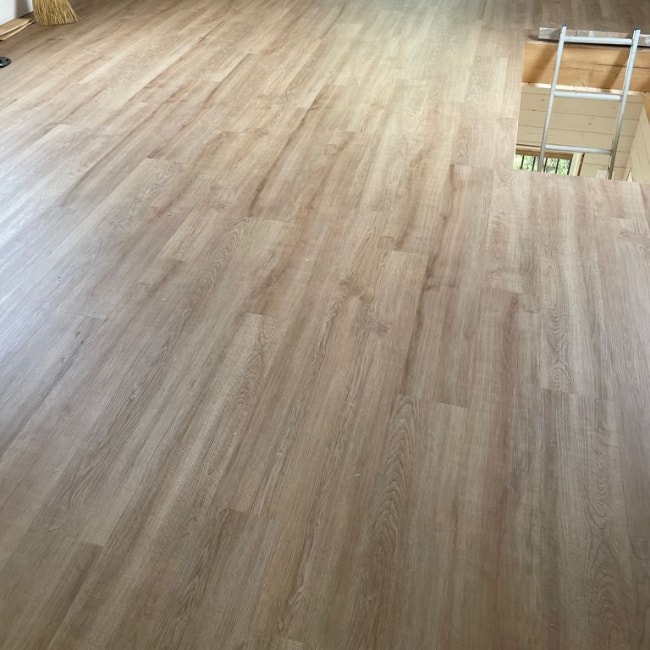 Image depicts new floors from a loose lay vinyl flooring installation project in London, Ontario.
