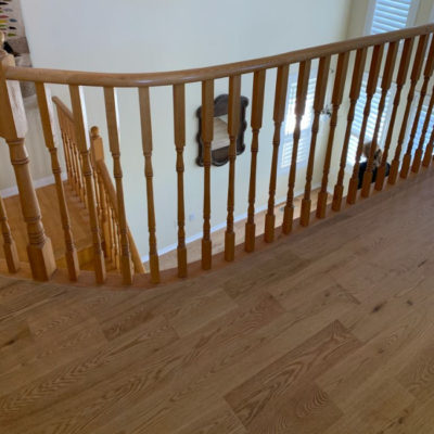 Image depicts new floors from a solid hardwood flooring installation project in Georgetown, Ontario.