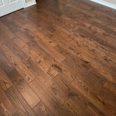 Image depicts new floors from a solid hardwood flooring installation project in London, Ontario.