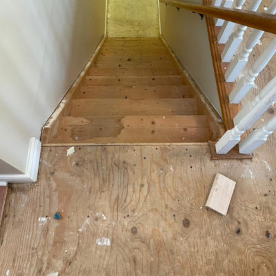 Image depicts old floors from a solid hardwood flooring installation project in London, Ontario.