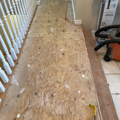 Image depicts old floors from a solid hardwood flooring installation project in London, Ontario.