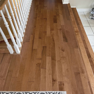 Image depicts new floors from a solid hardwood flooring installation project in London, Ontario.