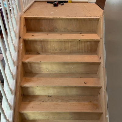 Image depicts old floors from a solid hardwood flooring installation project in London, Ontario.