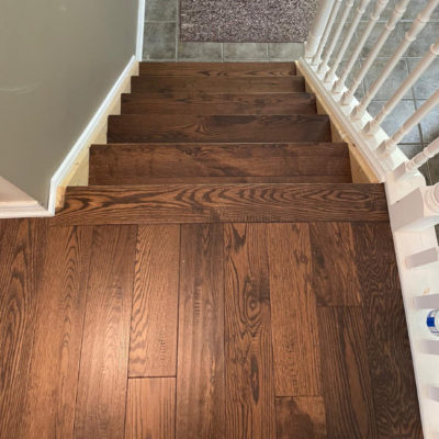 Image depicts new floors from a solid hardwood flooring installation project in London, Ontario.