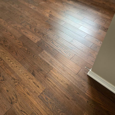 Image depicts new floors from a solid hardwood flooring installation project in London, Ontario.