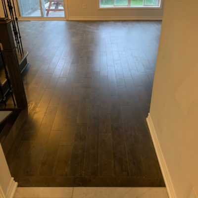 Image depicts new floors from a solid hardwood flooring installation project in Richmond Hill, Ontario.
