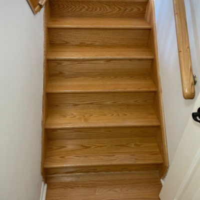 Image depicts old floors from a solid hardwood flooring installation project in Richmond Hill, Ontario.