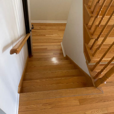 Image depicts old floors from a solid hardwood flooring installation project in Richmond Hill, Ontario.