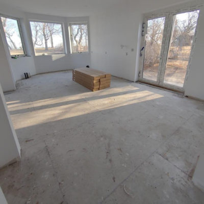 Image depicts old floors from a solid hardwood flooring installation project in Sarnia, Ontario.