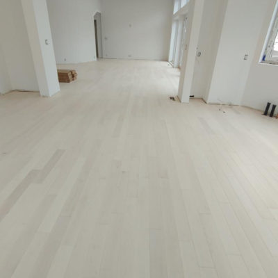 Image depicts new floors from a solid hardwood flooring installation project in Sarnia, Ontario.