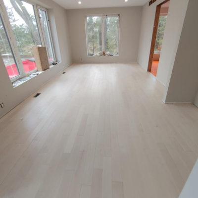 Image depicts new floors from a solid hardwood flooring installation project in Sarnia, Ontario.