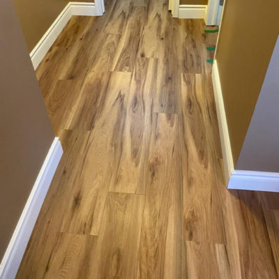 Image depicts new floors from a vinyl flooring installation project in Milton, Ontario.