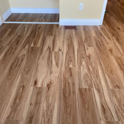 Image depicts new floors from a vinyl flooring installation project in Milton, Ontario.