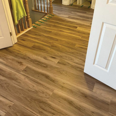 Image depicts new floors from a vinyl flooring installation project in Milton, Ontario.