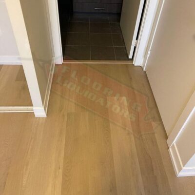 light brown vinyl floors installation in condo