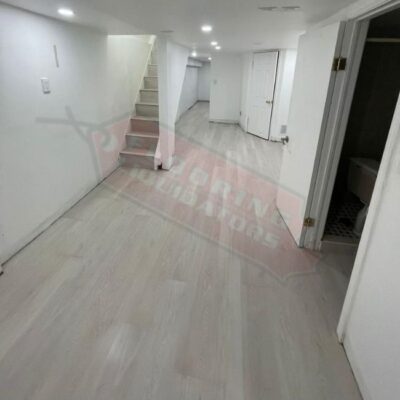 basement transformation with vinyl floor replacement